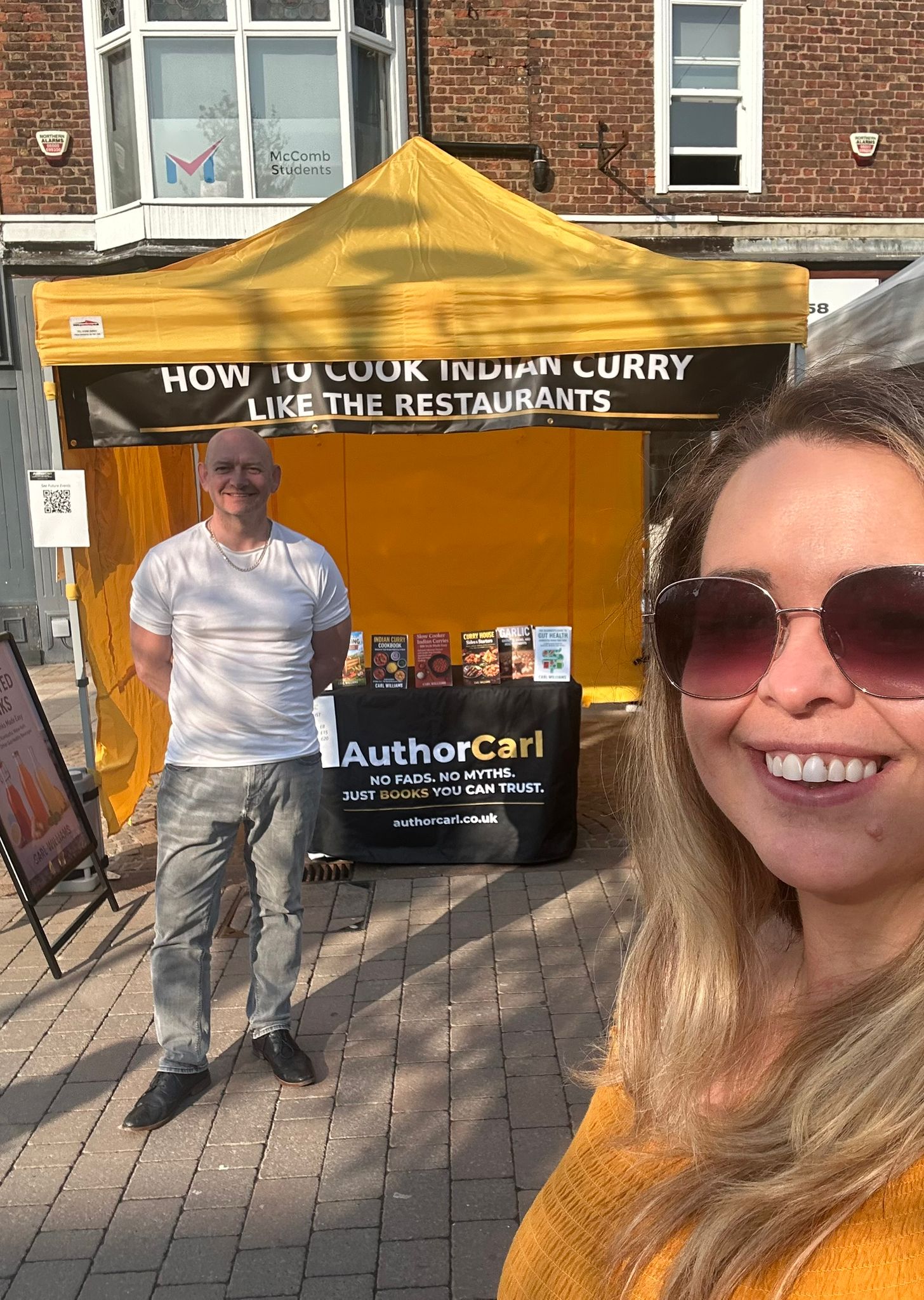 Author Carl stood at ormskirk market stall in West Lancashire